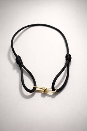 Náramok proti urieknutiu so zlatou ozdobou RH10